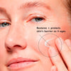 skinceuticals triple lipid-Close-up of a person applying skinceuticals cream